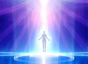 Silhouette ascending in radiant light beams.