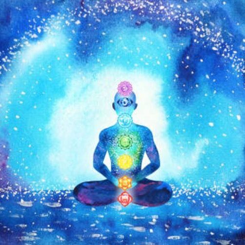 Meditative figure surrounded by glowing energy and chakra lights.